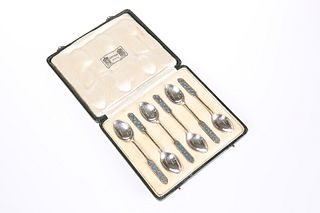 A SET OF SIX LIBERTY & CO SILVER AND ENAMEL SPOONS, BIRMINGHAM 1937, the te
