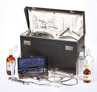 A 1950'S MEDICAL CASE, including an array of instruments and bottles. Case 