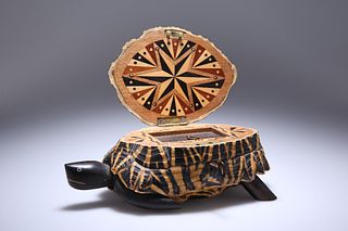 AN INDIAN STAR TORTOISE CASKET, the shell hinged and opening to a parquetry