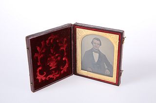 A VICTORIAN PORTRAIT DAGUERREOTYPE, of a gentleman, in a leather case with 