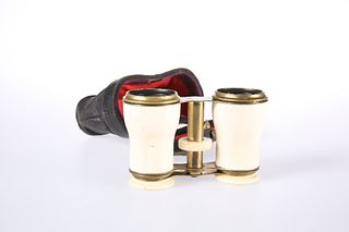 A PAIR OF LATE 19TH CENTURY IVORY AND BRASS OPERA GLASSES, cased.