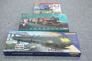 THREE BOXED HORNBY OO GAUGE ELECTRIC TRAIN SETS, comprising Hogwarts Expres