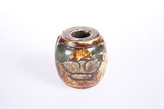 A JADE CARVING IN CHINESE ARCHAIC STYLE, of barrel form, decorated in two p
