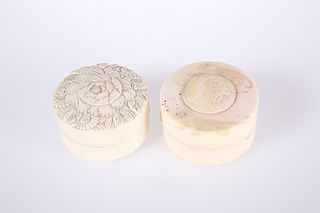 TWO JAPANESE MEIJI PERIOD IVORY BOXES, circular, the cover of one decorated