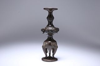 A CHINESE BRONZE STAND, of knopped baluster form, the dished top above a kn