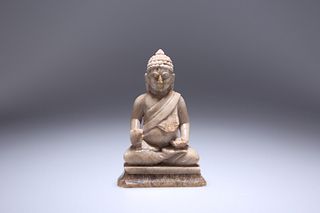 A SOAPSTONE CARVING OF THE BUDDHA, 19TH CENTURY, carved seated. 14cm