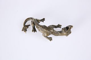 AN UNUSUAL BRONZE OF A DRAGON, with up-twisted head, 19th Century. 19.5cm