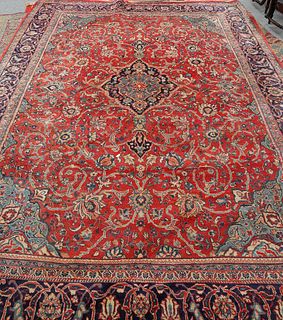 A LARGE MAHAL CARPET, with a central blue medallion against a red ground. 4