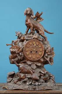 A LARGE BLACK FOREST CARVED OAK MANTEL CLOCK, LATE 19th CENTURY, the wooden