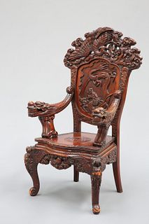 A CHINESE CARVED THRONE CHAIR, the crest pierced and carved with a phoenix 