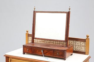 A GEORGE III MAHOGANY TOILET MIRROR, with urn-topped reeded uprights, the b