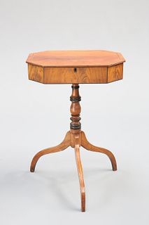A REGENCY MAHOGANY WORK TABLE, the rectangular top with canted corners and 