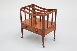 A REGENCY MAHOGANY CANTERBURY, with inverted arch dividers, the base with r