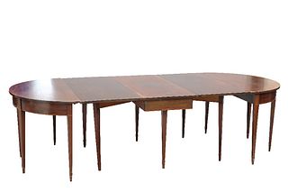 A GEORGE III MAHOGANY D-END DINING TABLE, comprising a gateleg centre secti