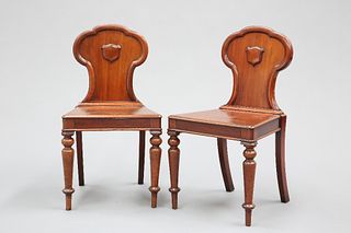 A PAIR OF MAHOGANY HALL CHAIRS, MID 19TH CENTURY, with cartouche shaped mou