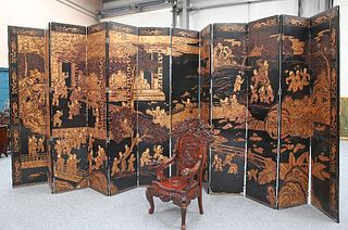 A LARGE CHINESE EXPORT PARCEL-GILT AND LACQUER TWELVE-FOLD SCREEN, depictin