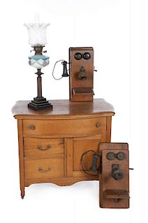 DOM DeLUISE ANTIQUE CABINET, HURRICANE LAMP AND WALL TELEPHONES