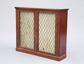 A REGENCY MAHOGANY SIDE CABINET, IN THE MANNER OF GILLOWS, the pair of door