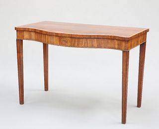 A GEORGE III MAHOGANY SERPENTINE SERVING TABLE, the top inlaid with cluster