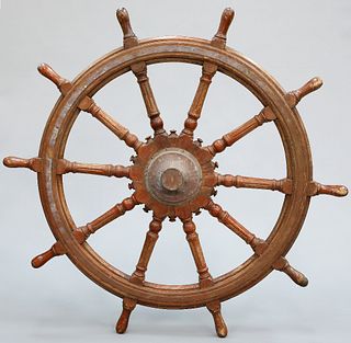 A LARGE HARDWOOD SHIP'S WHEEL OF OVER 5-FOOT DIAMETER, with ten fluted spok