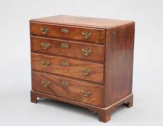 A GEORGE III MAHOGANY CHEST OF DRAWERS, with crossbanded caddy top above fo