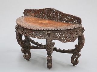 AN ANGLO-INDIAN HARDWOOD CONSOLE TABLE, 19TH CENTURY, demilune, profusely p