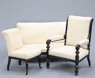 A VICTORIAN EBONISED AND UPHOLSTERED PARLOUR SUITE, comprising settee, armc