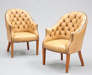 A HANDSOME PAIR OF BUTTON-BACK LEATHER LIBRARY CHAIRS, upholstered in light