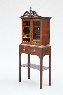 A MAHOGANY CABINET ON STAND, 18TH CENTURY AND LATER, the upper section with