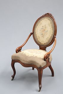 A VICTORIAN WALNUT AND UPHOLSTERED PANEL-BACK DRAWING ROOM CHAIR, the oval 