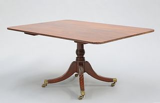 A REGENCY MAHOGANY TILT-TOP BREAKFAST TABLE, the rectangular top with reede