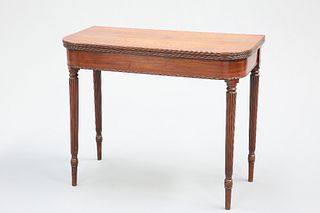 A REGENCY MAHOGANY FOLDOVER TEA TABLE, with rounded corners and reeded edge
