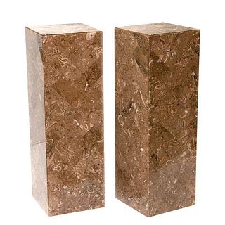 Pair of marble stands.