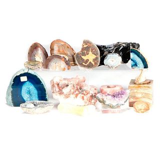 A collection of crystal and mineral specimens.