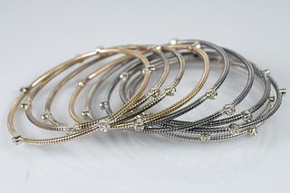 Group, Ten 18K Gold Bangle Bracelets with Diamonds