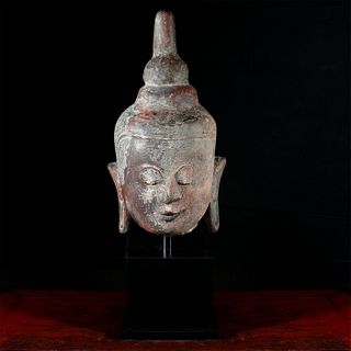LARGE 16TH CENTURY THAI STONE HEAD OF BUDDHA, WOODEN BASE