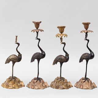 Two Pairs of Chinoiserie Parcel-Gilt-Bronze Crane Form Candlesticks