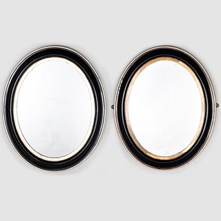Two Similar Small Victorian Ebonized Parcel and Silver-Gilt Oval Mirrors