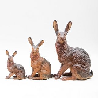 Three Continental Painted Terracotta Models of Hares in Three Sizes
