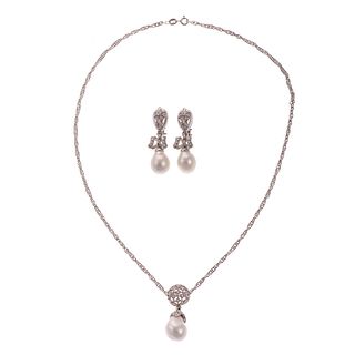 A Pearl & Diamond Necklace & Earrings in 18K