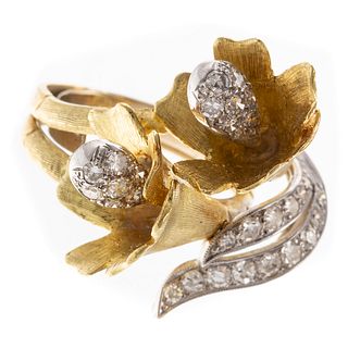An 18K Yellow Gold Diamond Flower Ring