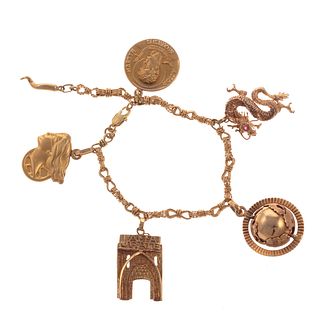 An 18K Charm Bracelet in Gold with 14K Charms