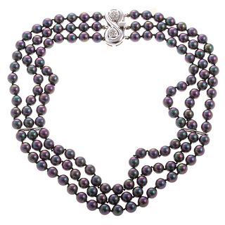 A Tahitian Three Strand Pearl Necklace in 18K