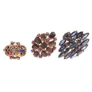 A Trio of Gemstone Cluster Rings in Gold