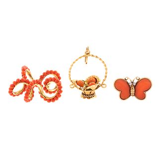 A Collection of Coral Charms & Butterfly Ring