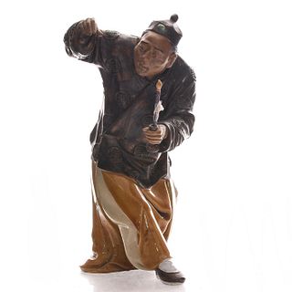 CHINESE CERAMIC FIGURINE, MAN WITH CANDLE