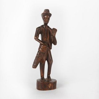 HAND CARVED WOODEN FIGURE, MAN WITH HAT PLAYING DRUM