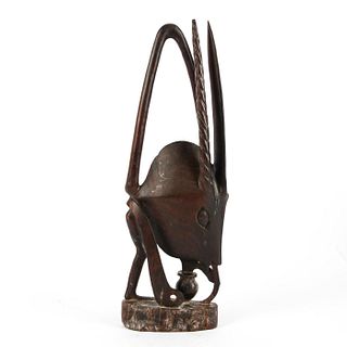 AFRICAN WOODEN FIGURE, ANT DRINKING FROM PLANT