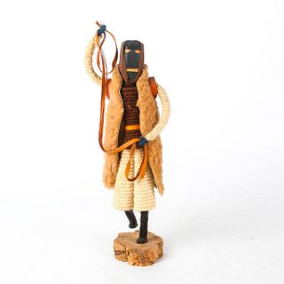 WOODEN AND ROPE FIGURE WITH SHEEPSKIN GARMENT