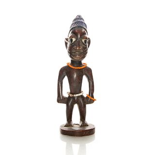 NIGERIAN WOOD SCULPTURE OF MAN WITH BEADS